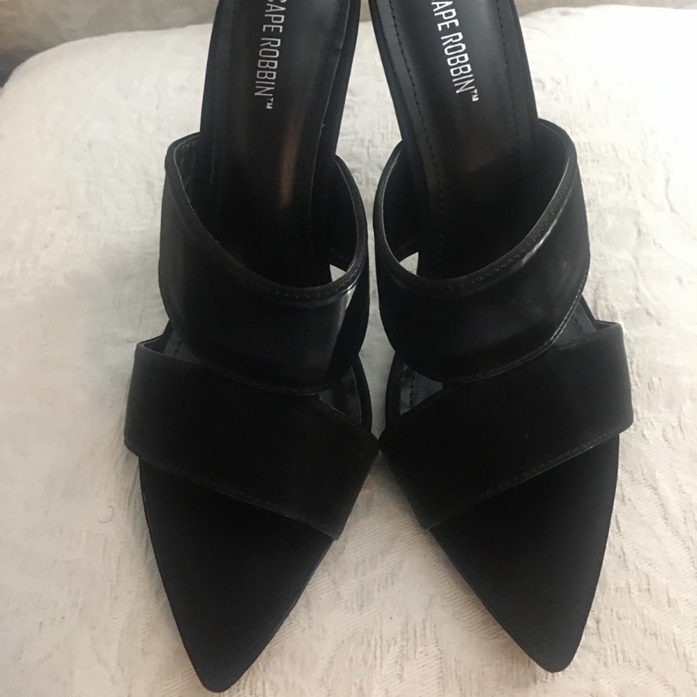 Never Worn Sexy black sandals size 8 but fits like size 7.